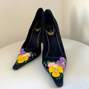 Hand painted purple yellow and pink flowers on a black pump
